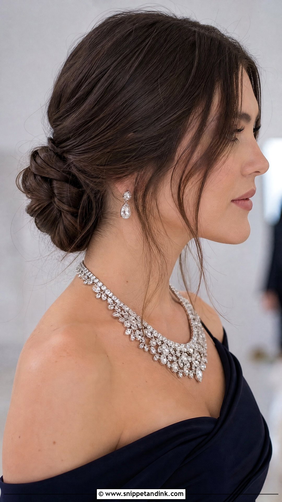 Knotted Low Bun - Snippet and Ink - 20 Medium Length Hair Styles for Wedding Guest