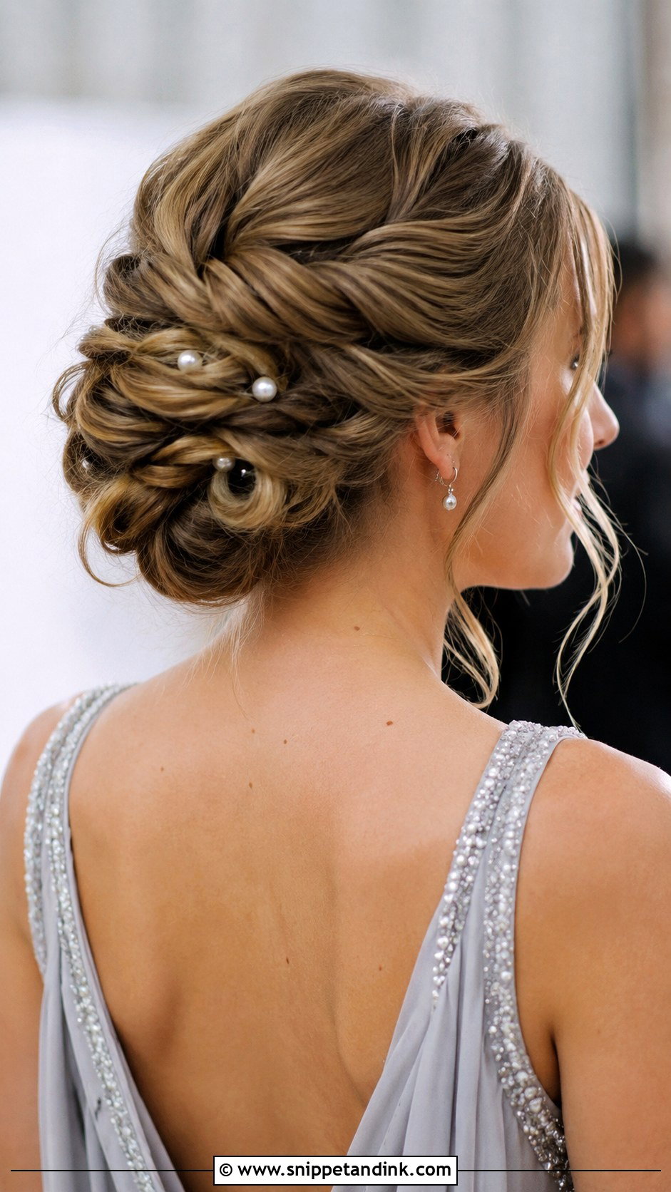 Knotted Updo - Snippet and Ink - 35 Wedding Guest Hair Ideas