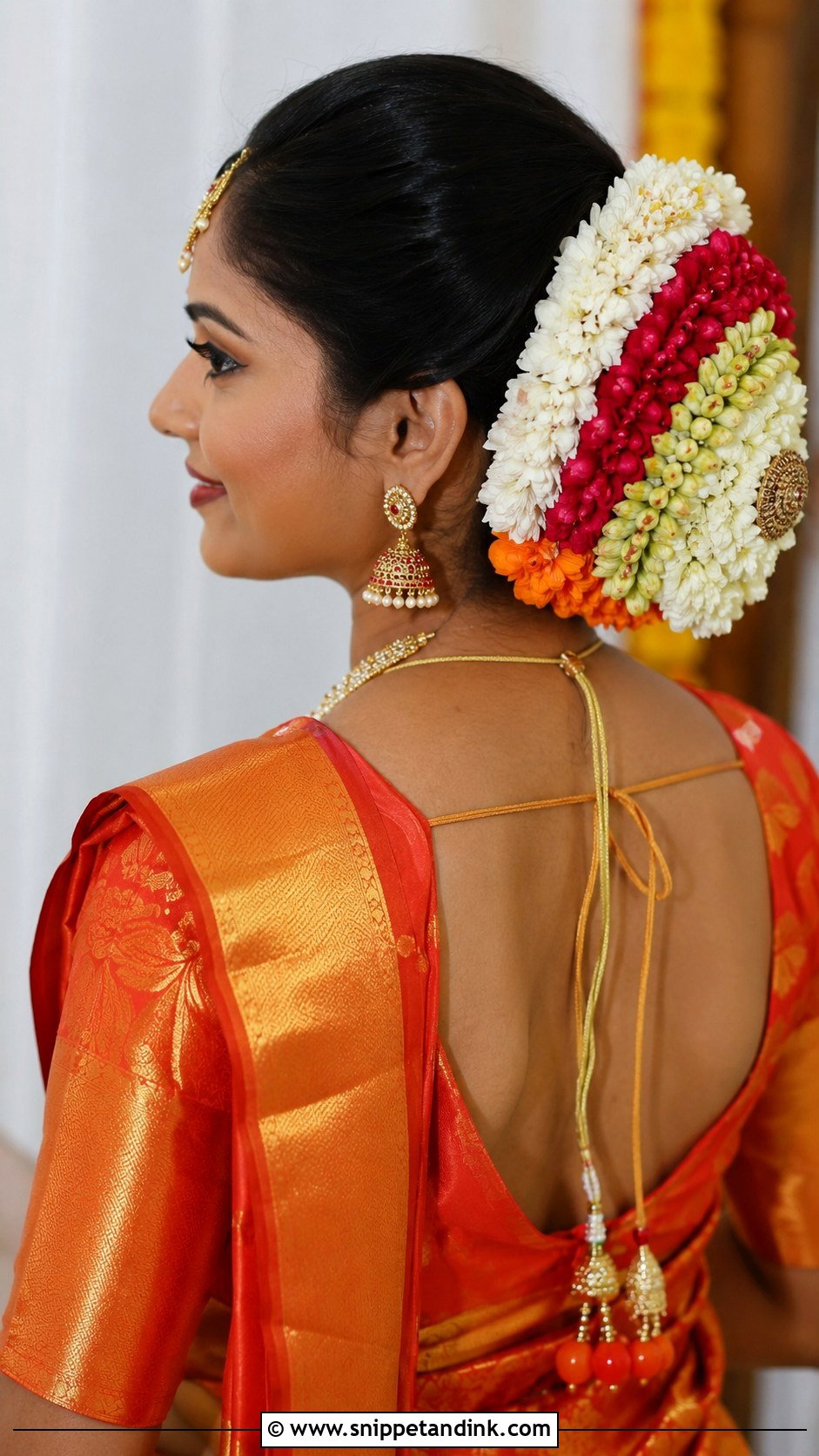 Layered Flower Bun For Wedding - Snippet and Ink - 25 Indian Front Look Bridal Bun Hairstyles