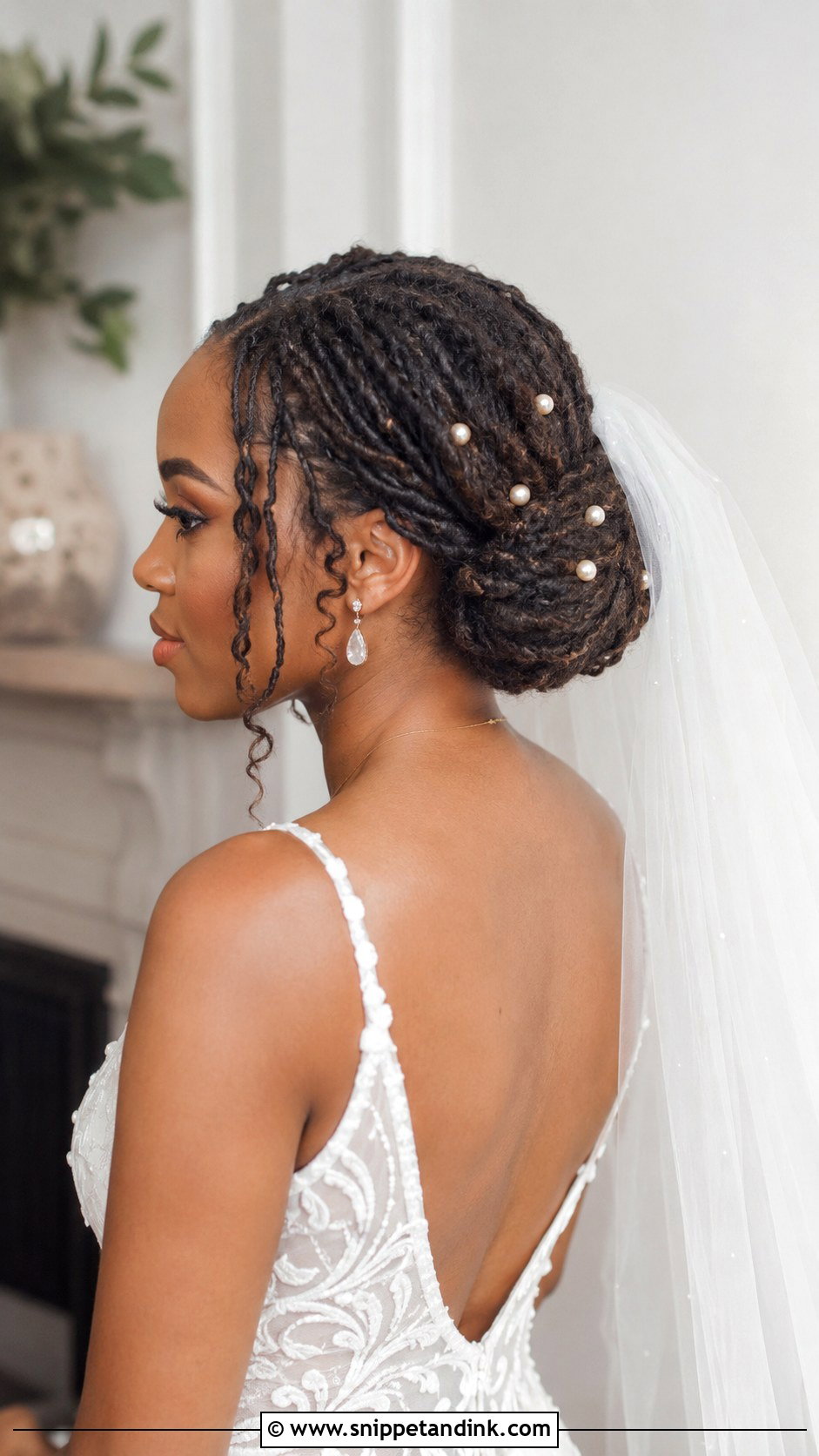 Loc Low Bun with Veil - Snippet and Ink - 20 Dreadlocks Wedding Hairstyles Brides