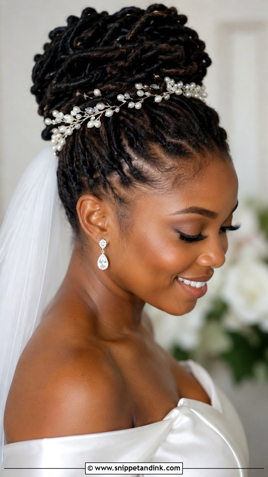 Long Locs In A High Bun - Snippet and Ink - 30 Natural Hair Bride Ideas