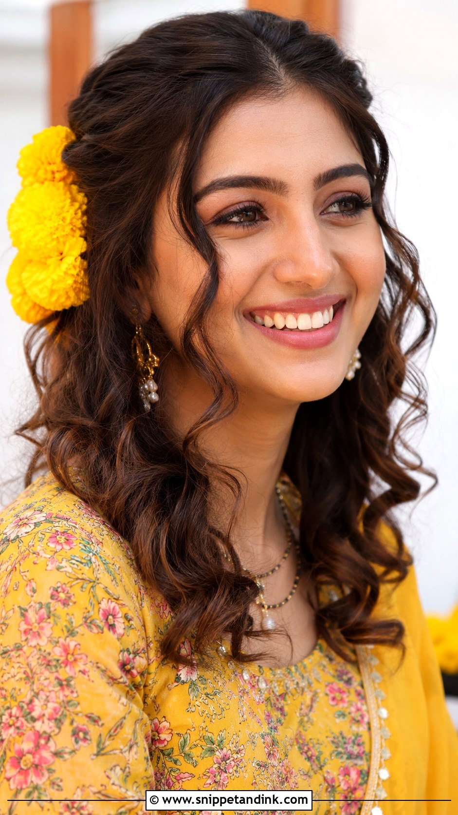 Loose Curls With Marigold Flowers - Snippet and Ink - 25 Haldi Ceremony Hairstyle for Bride Ideas
