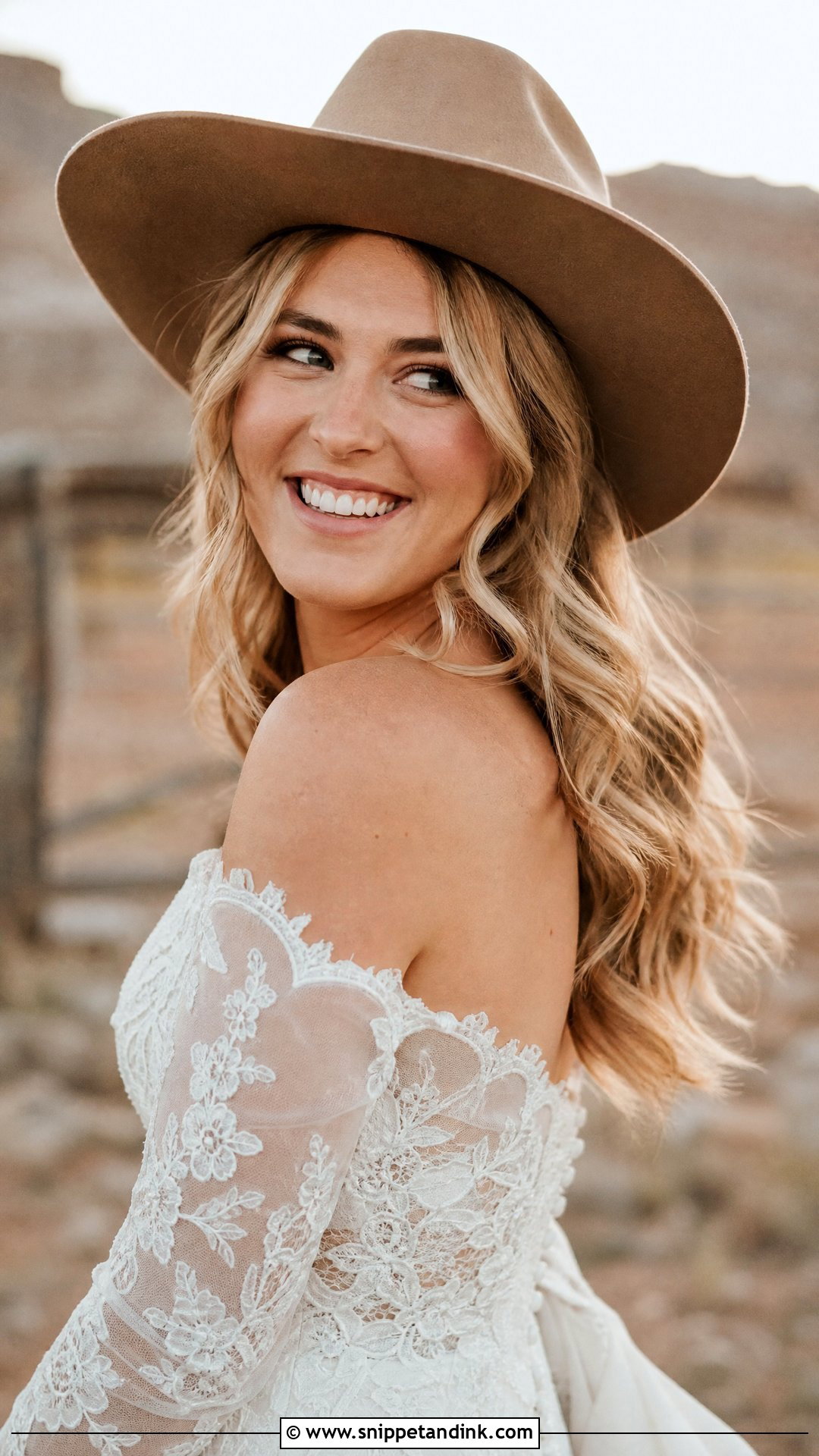 Loose Curls With a Cowboy Hat - Snippet and Ink - 20 Western Wedding Hair Ideas