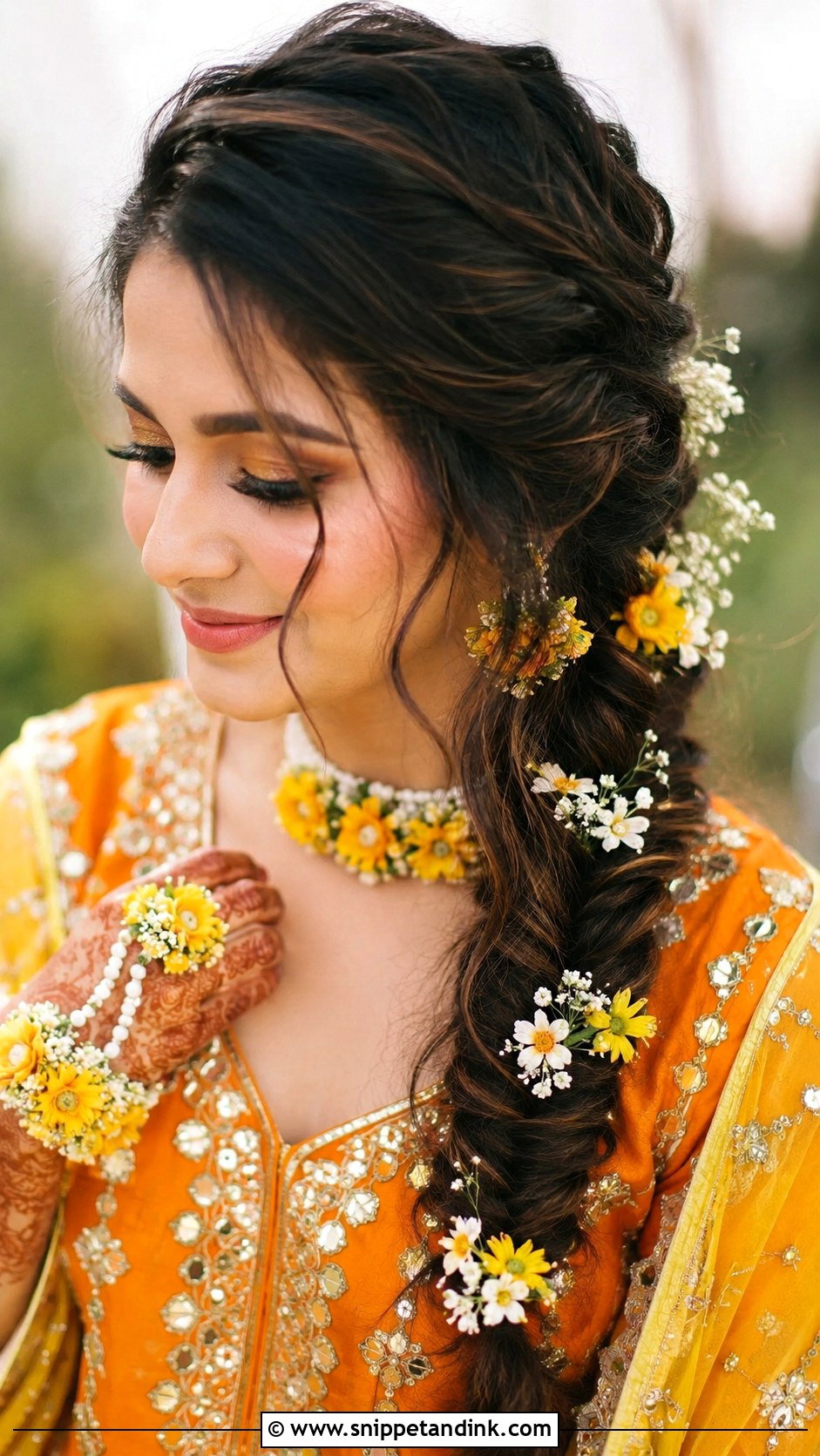 Loose Fishtail Braid With Flowers - Snippet and Ink - 25 Indian Wedding Hairstyle for Chubby Face Ideas