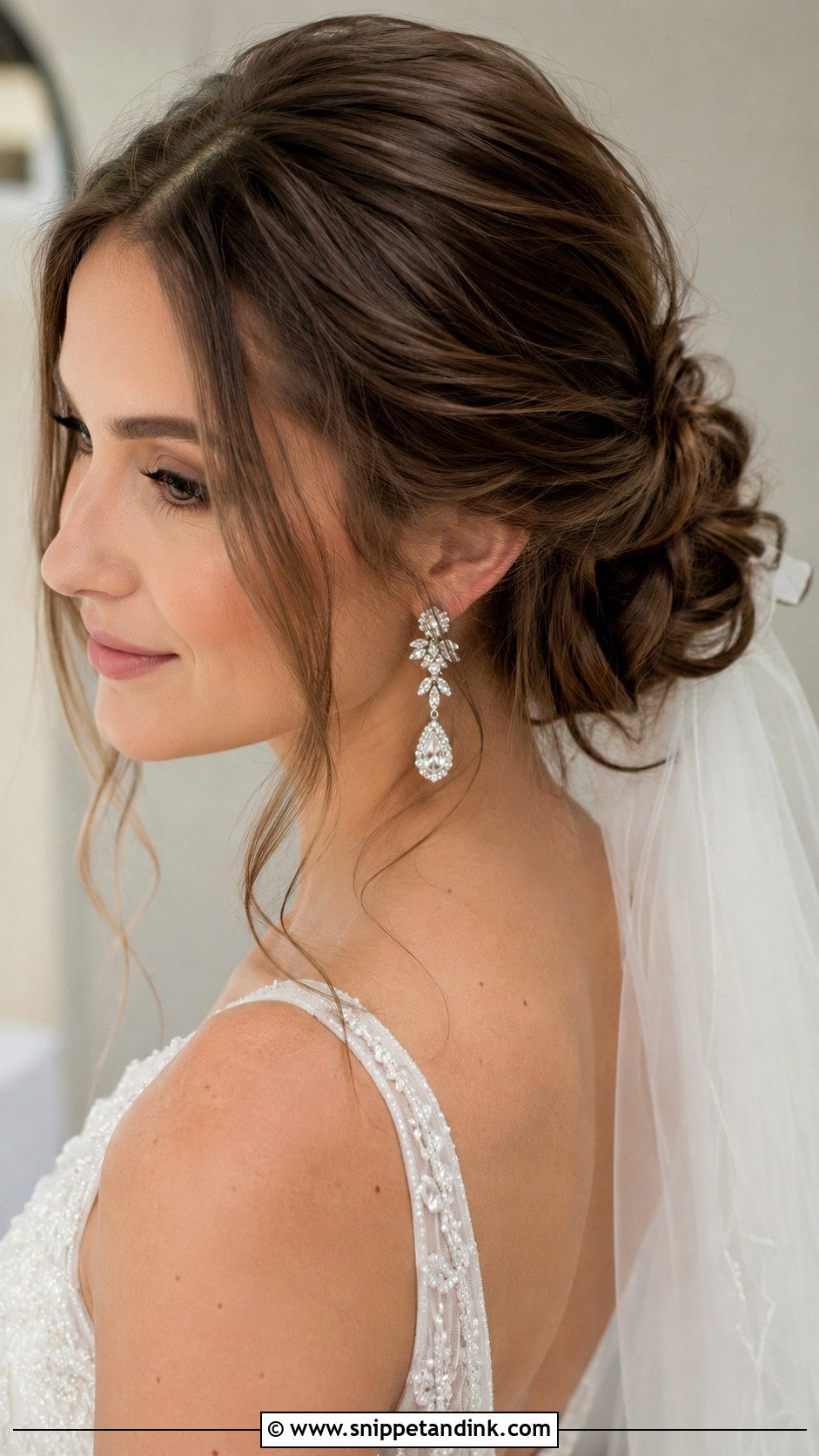 Loose Low Bun Wedding Hairstyle - Snippet and Ink - 20 Loose Bridal Hair Ideas