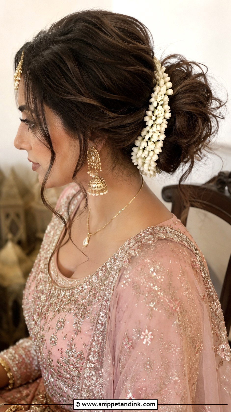 Loose Messy Bun With Fresh Flowers - Snippet and Ink - 20 Pakistani Barat Bride Hairstyles