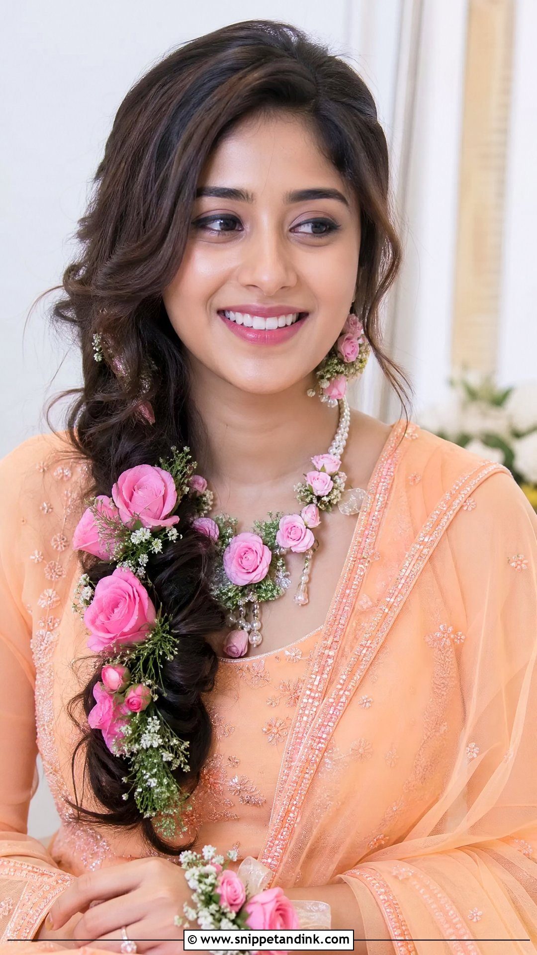 Loose Side Braid With Roses - Snippet and Ink - 20 Indian Bridal Braids for Long Hair