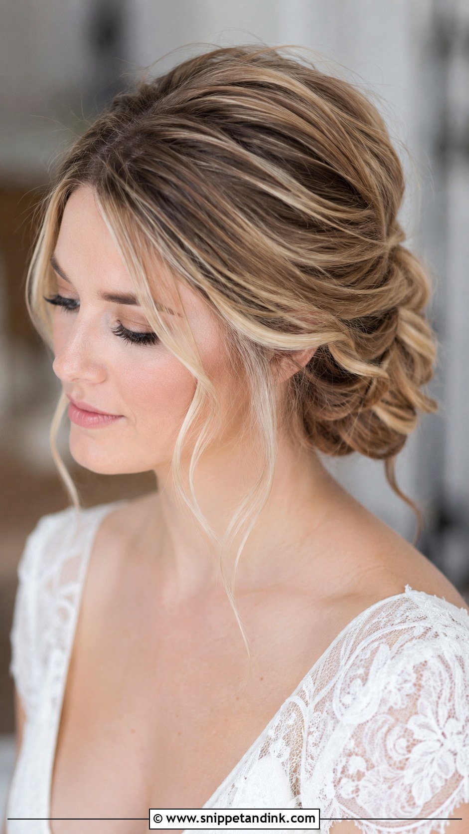 Loose Twisted Wedding Bun - Snippet and Ink - 20 Loose Wedding Bun Ideas