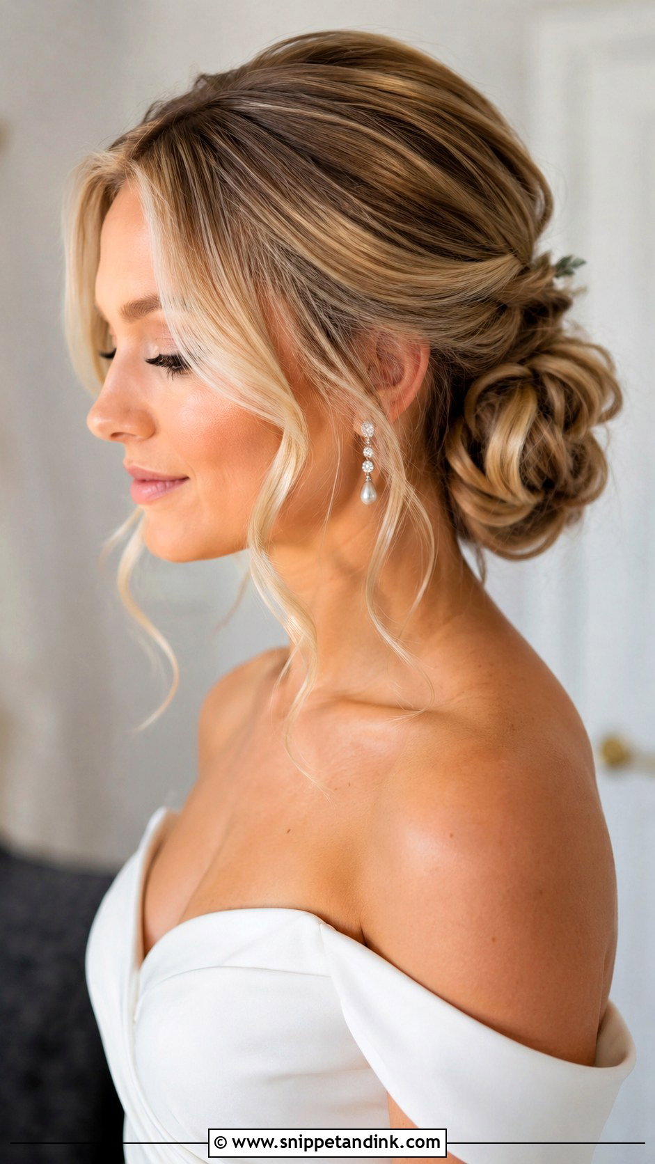 Loose Wedding Bun With Face Framing Pieces - Snippet and Ink - 20 Loose Wedding Bun Ideas