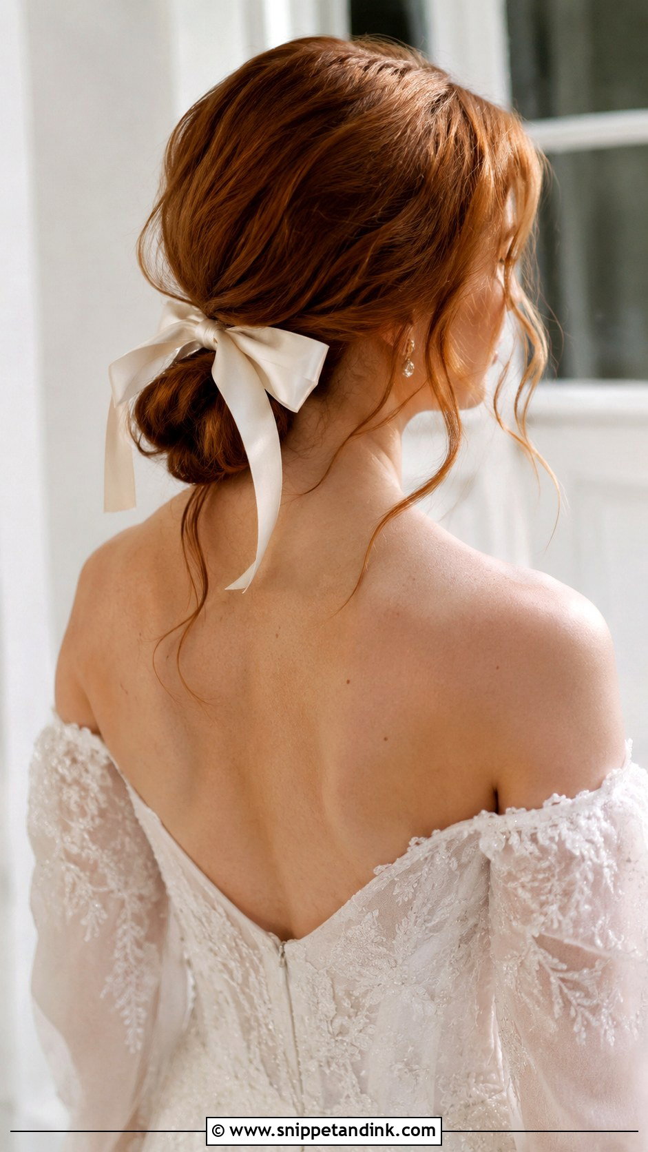 Low Bow Bun With Loose Strands - Snippet and Ink - 20 Bridal Hair Bow Ideas
