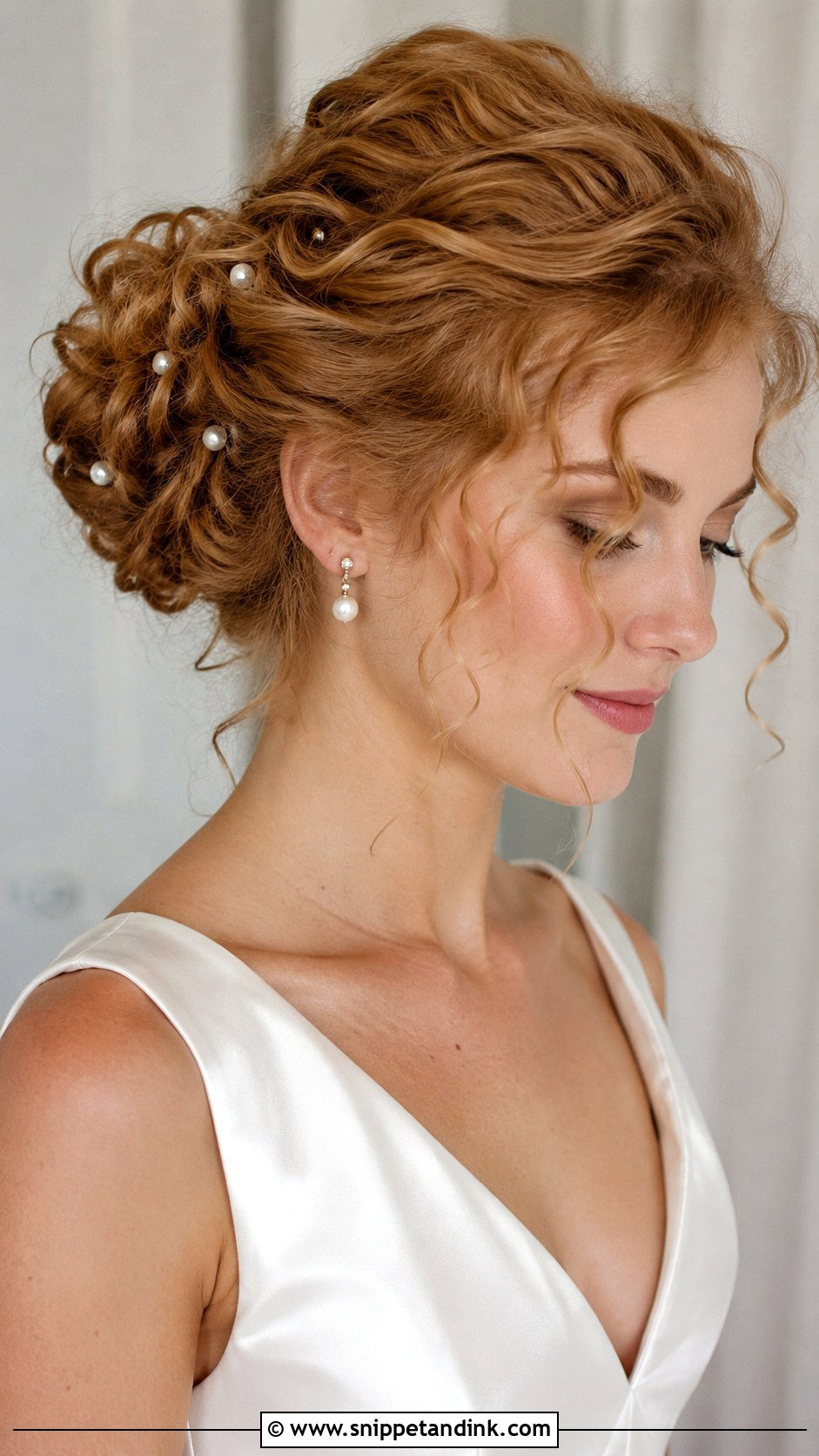 Low Bun Curly Hair With Pearl Pins - Snippet and Ink - 15 Low Bun Curly Hair Wedding Ideas