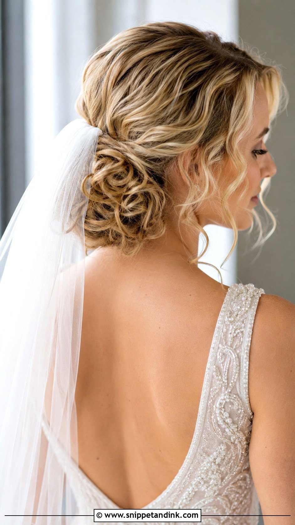 Low Bun Curly Hair With Veil - Snippet and Ink - 15 Low Bun Curly Hair Wedding Ideas