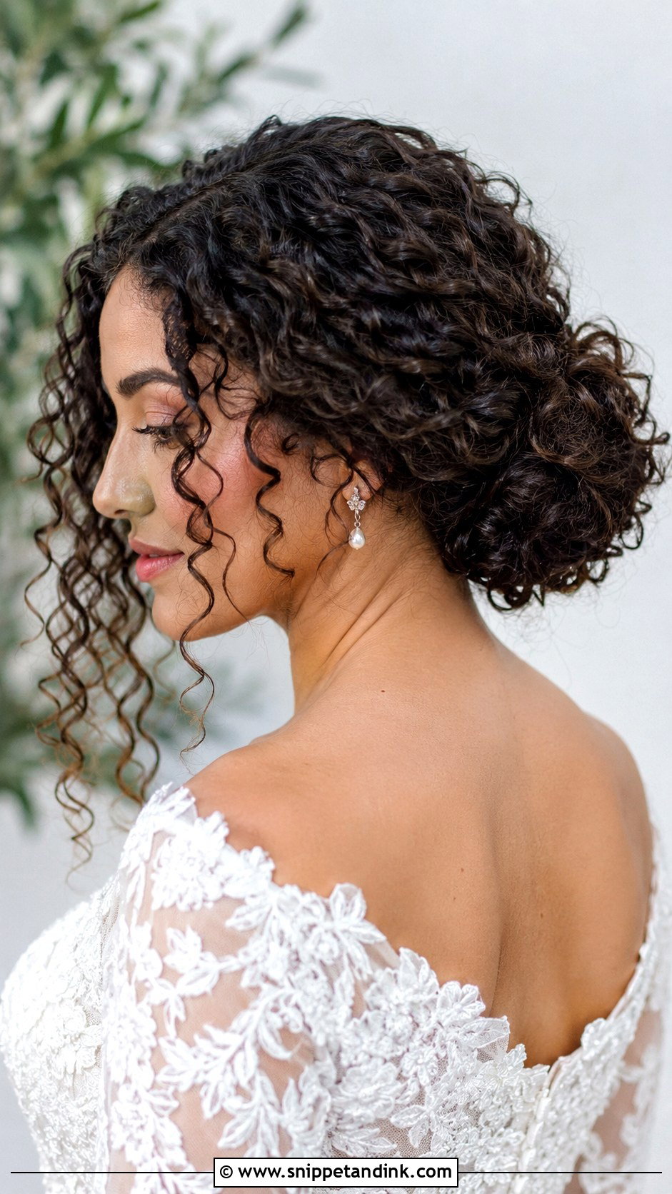 Low Bun For Curly Hair - Snippet and Ink - 30 Low Updo Wedding Hair Ideas