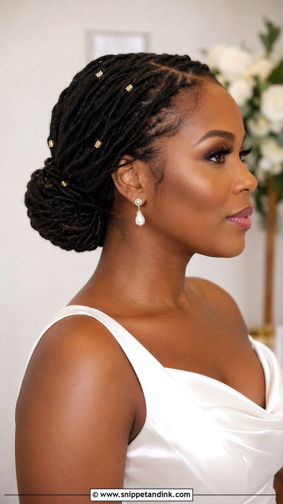 Low Bun Loc Wedding Hairstyle - Snippet and Ink - 20 Elegant Loc Styles Wedding Hairstyles