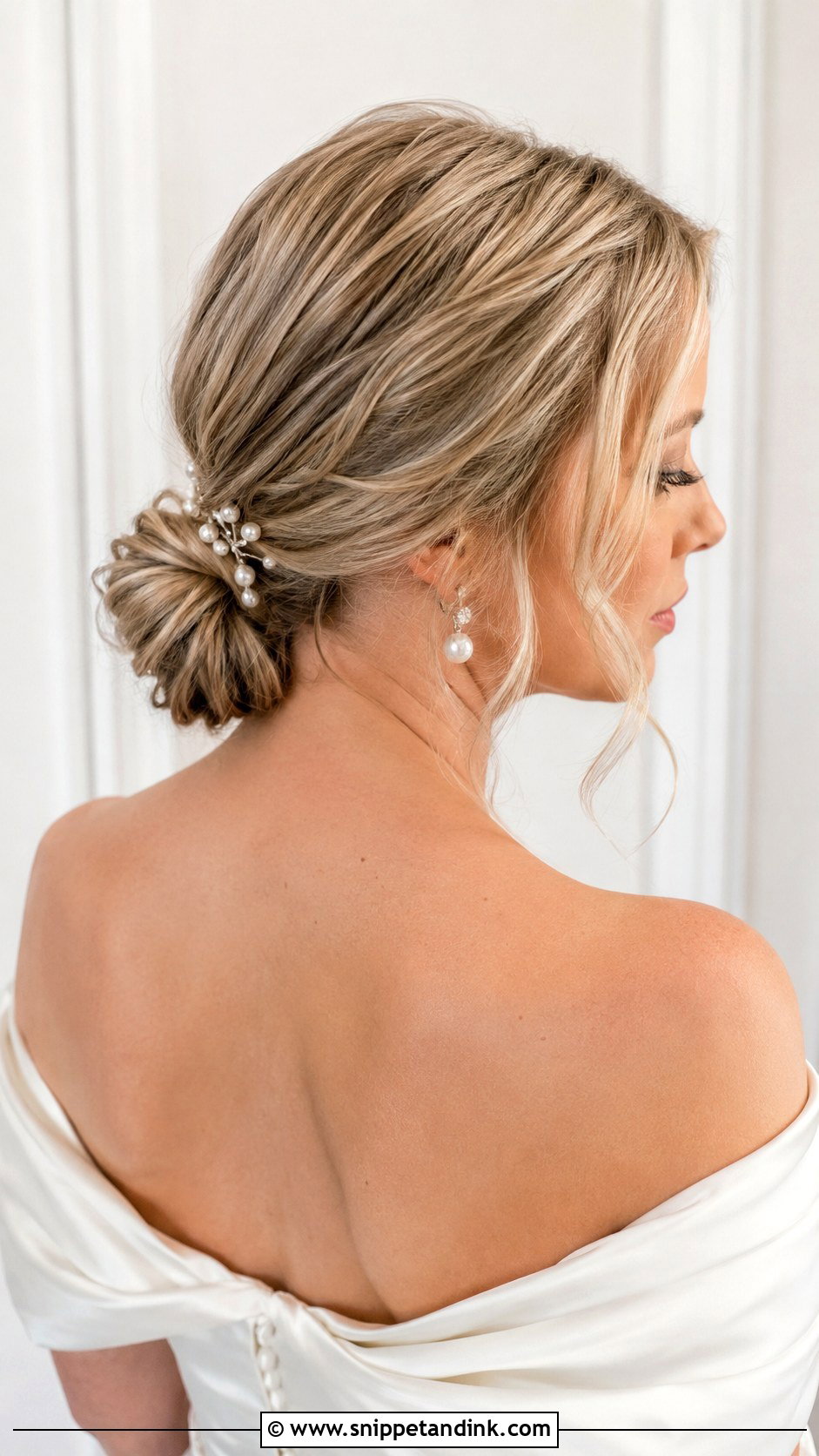 Low Bun Wedding Hairstyle For Off Shoulder Dress - Snippet and Ink - 15 Wedding Hairstyles for Off Shoulder Dress