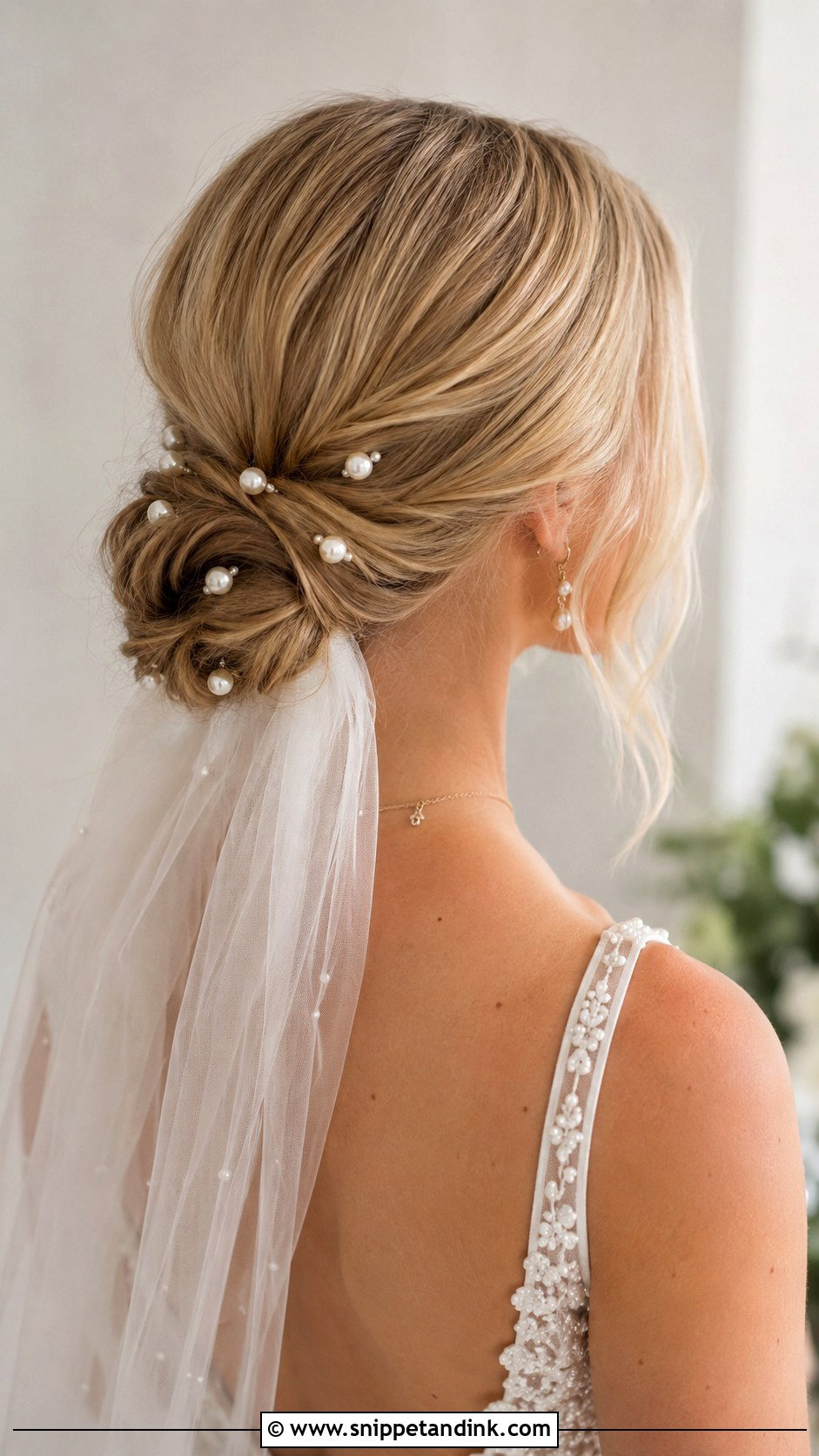 Low Bun Wedding Hairstyle With Pearl Pins - Snippet and Ink - 15 Wedding Hairstyles with Hair Accessories