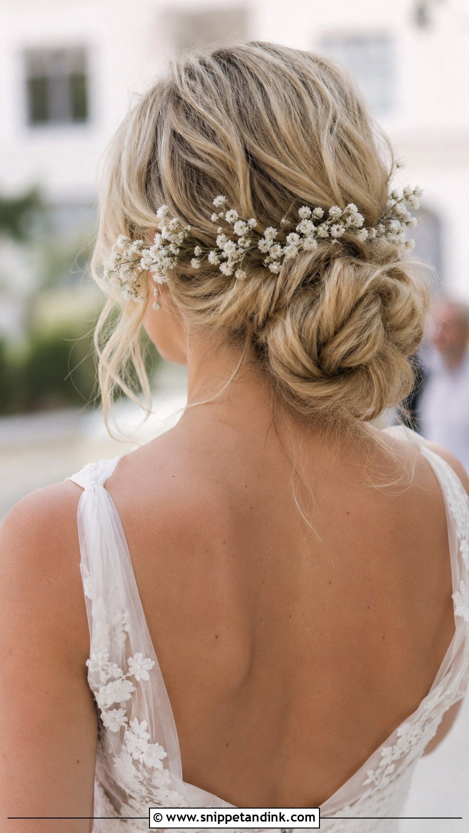 Low Bun With Babys Breath - Snippet and Ink - 30 Low Bun Bridal Hair Ideas