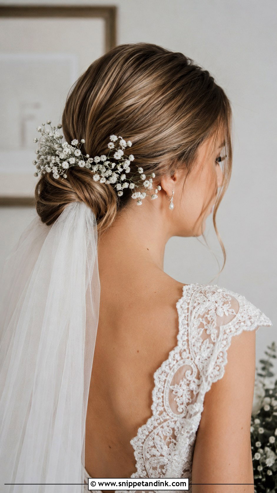 Low Bun With Babys Breath - Snippet and Ink - 20 Wedding Hairstyles Flowers