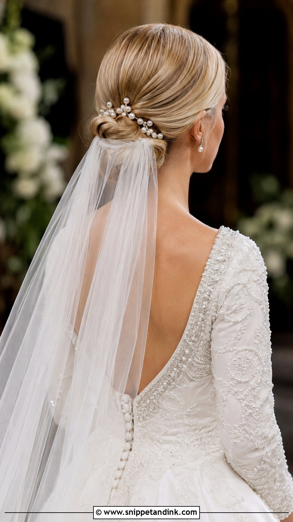 Low Bun With Cathedral Veil - Snippet and Ink - 30 Timeless Bridal Hair Ideas