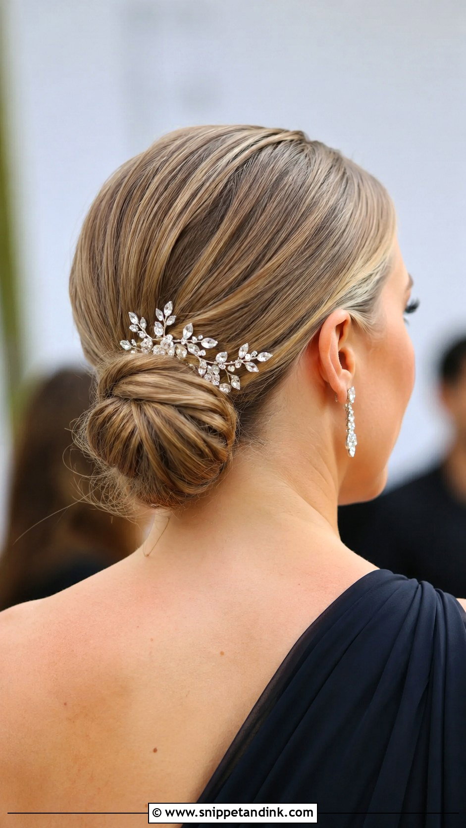 Low Bun With Crystal Accents - Snippet and Ink - 30 Low Bun Bridal Hair Ideas