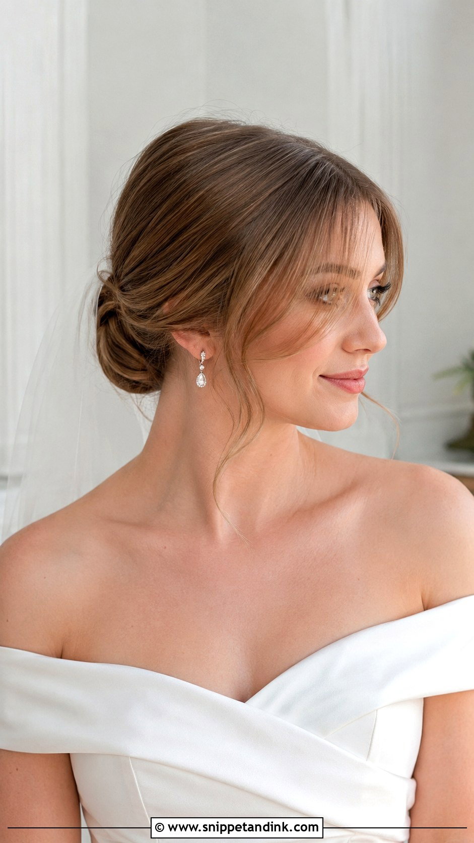Low Bun With Curtain Bangs - Snippet and Ink - 20 Hairstyles with Bangs for Wedding
