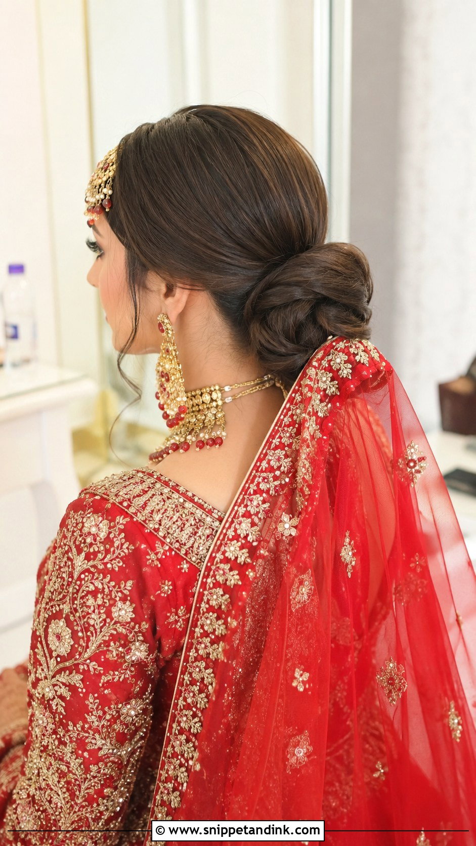 Low Bun With Dupatta Pinned at the Nape - Snippet and Ink - 20 Pakistani Bridal Hairstyles with Dupatta