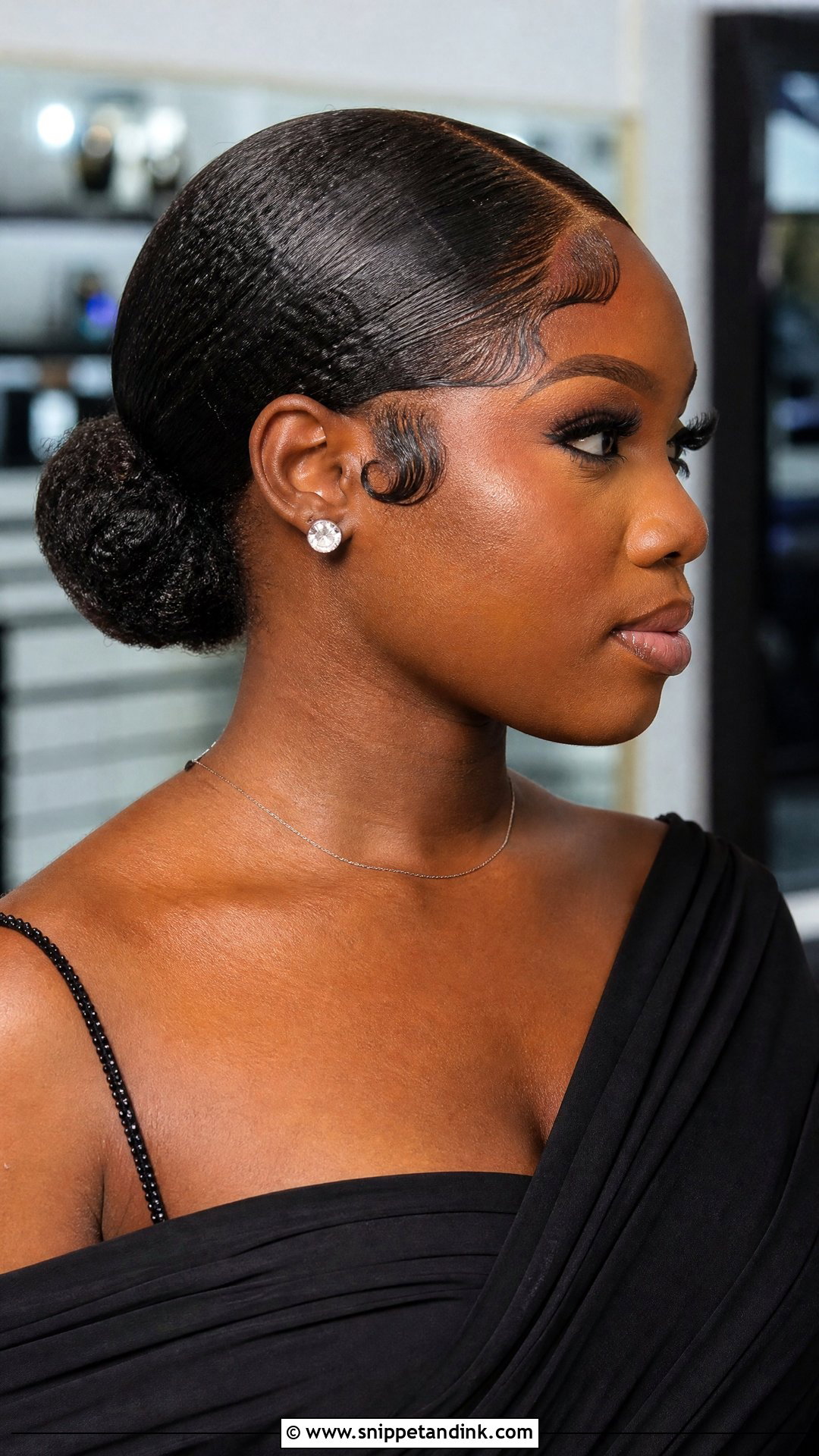 Low Bun With Edges - Snippet and Ink - 20 Natural Hairstyles for Wedding Guest
