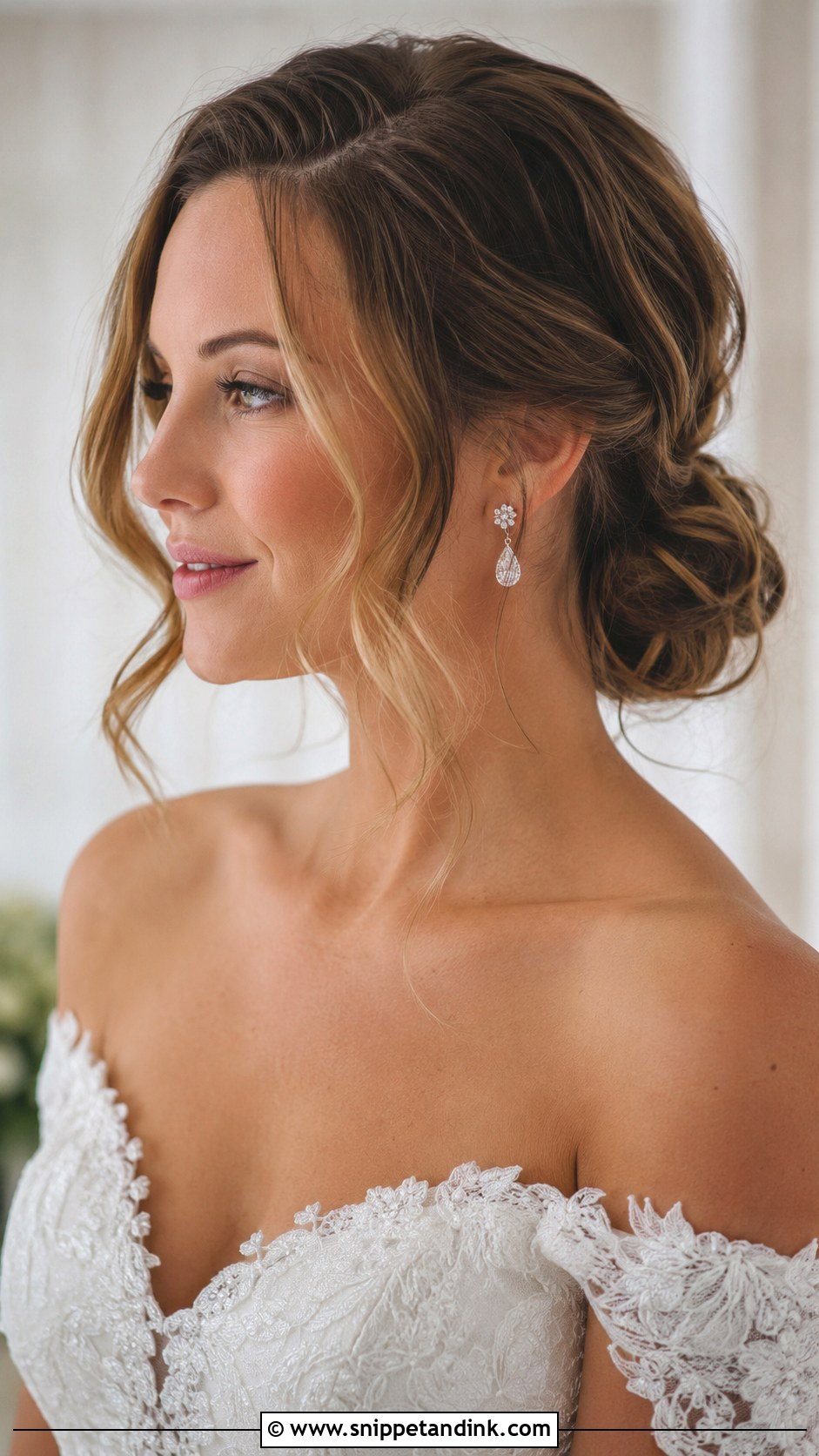 Low Bun With Face Framing Tendrils - Snippet and Ink - 25 Wedding Upstyles