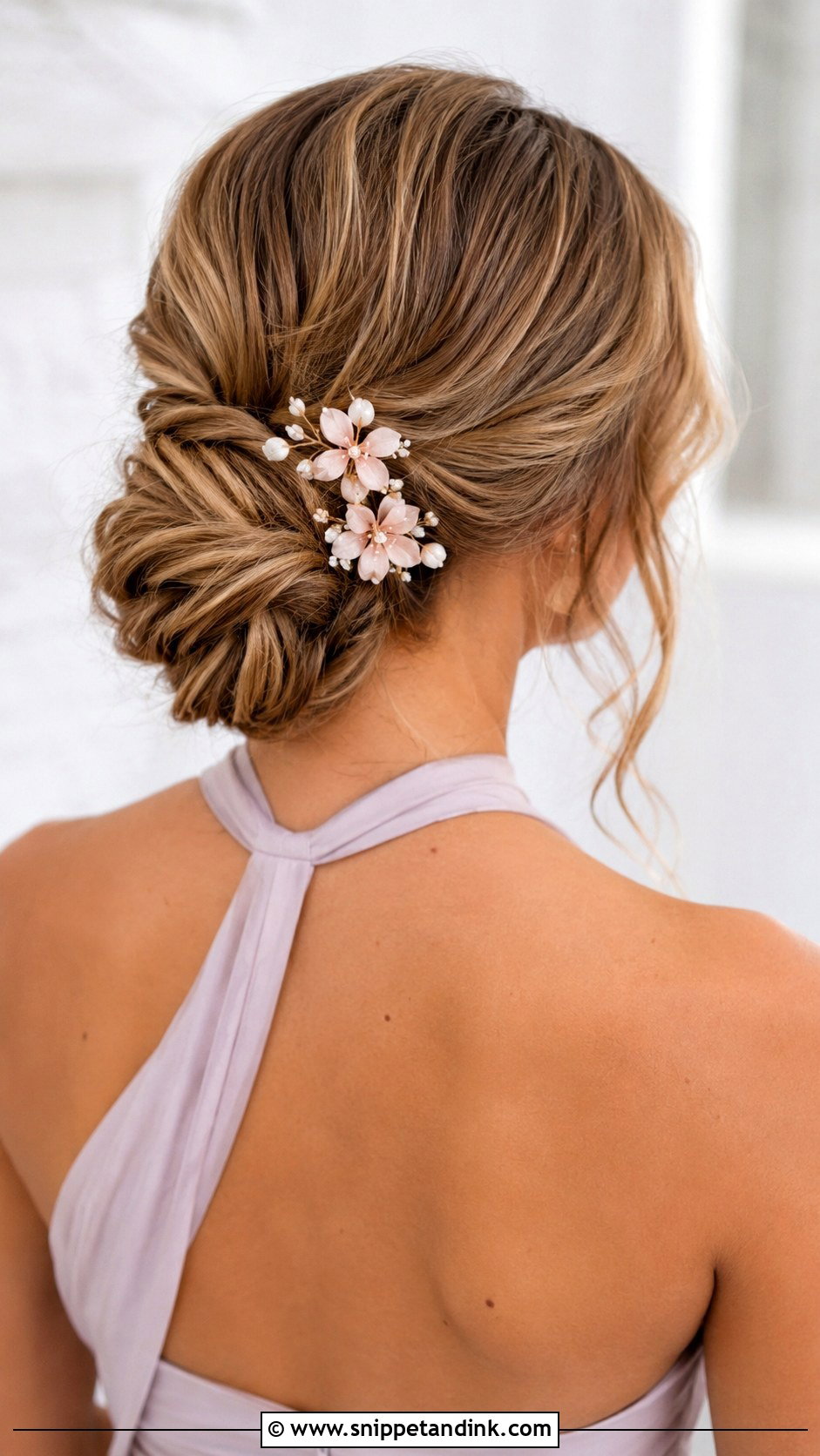 Low Bun With Floral Pins Bridesmaid Hair - Snippet and Ink - 20 Low Updo Wedding Hair Bridesmaid Ideas