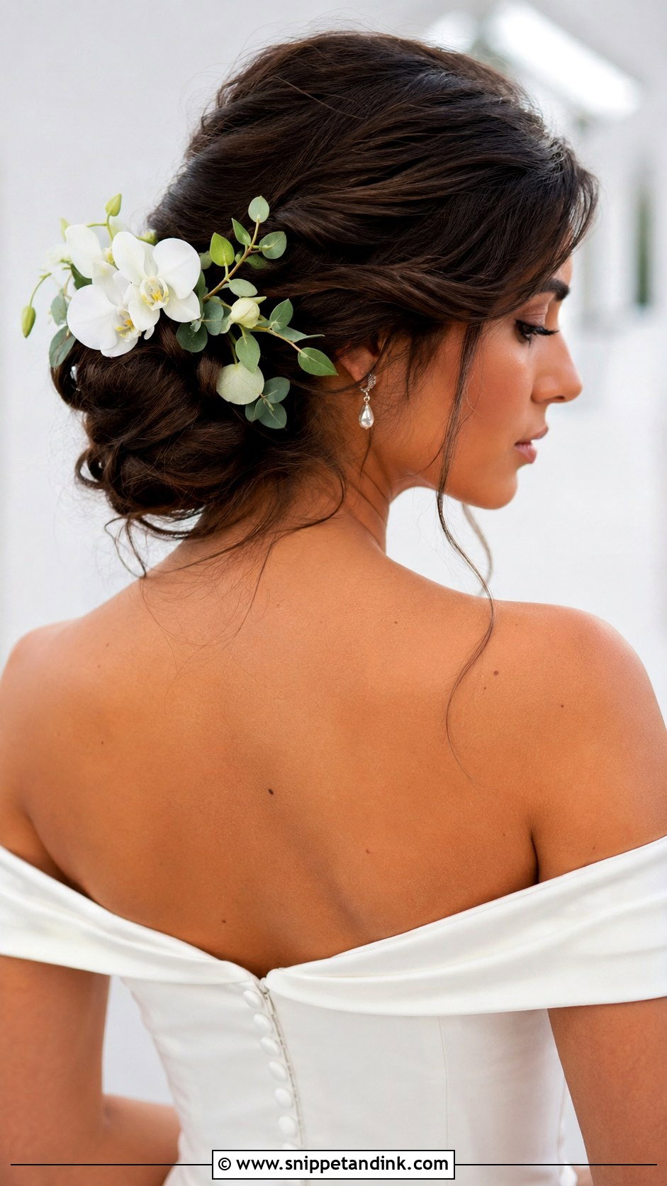 Low Bun With Flowers - Snippet and Ink - 20 Flower Bridal Hair Decorations Ideas