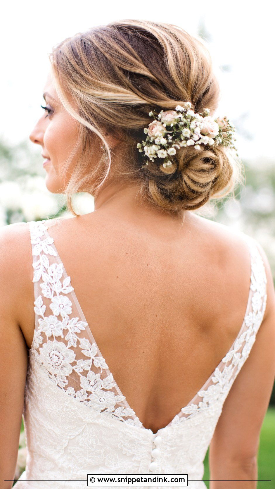 Low Bun With Fresh Flowers - Snippet and Ink - 25 Low Bun Hairstyles Wedding