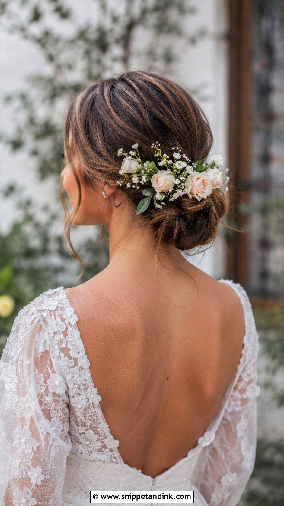 Low Bun With Fresh Flowers - Snippet and Ink - 25 Simple Low Bun Wedding Hair Ideas