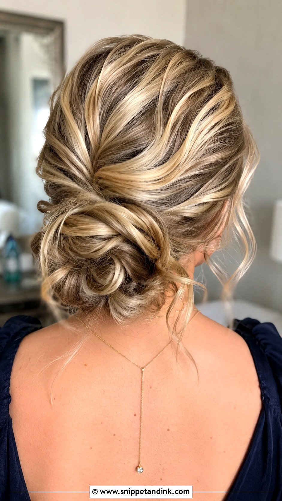 Low Bun With Highlights - Snippet and Ink - 20 Low Bun Wedding Guest Hair Ideas