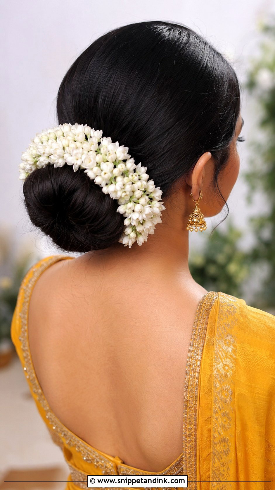 Low Bun With Jasmine Gajra - Snippet and Ink - 25 Haldi Ceremony Hairstyle for Bride Ideas