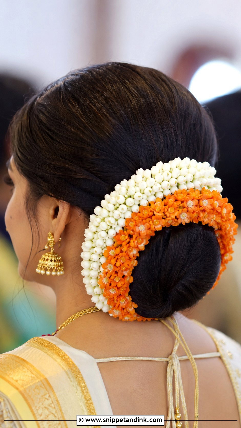 Low Bun With Jasmine and Kanakambaram - Snippet and Ink - 30 Kerala Bride Hairstyles