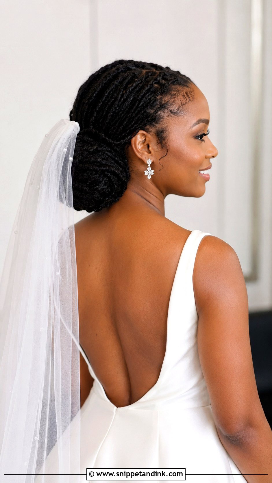 Low Bun With Locs - Snippet and Ink - 20 Loc Wedding Hairstyles Brides