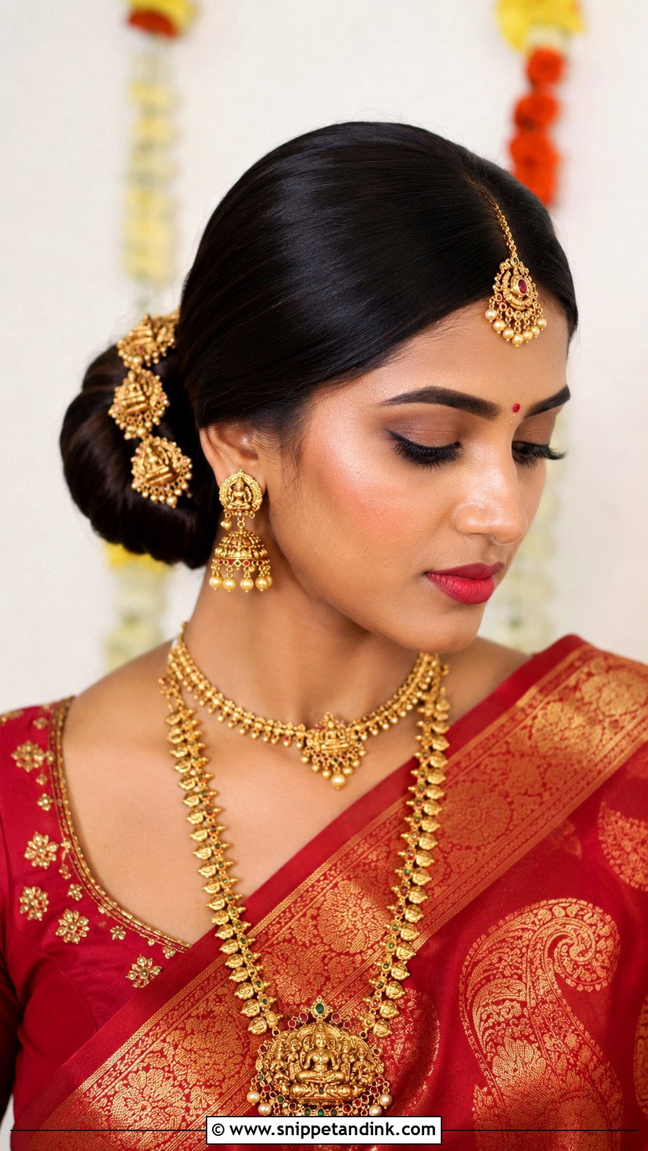 Low Bun With Middle Parting - Snippet and Ink - 25 Trendy Indian Wedding Hairstyles