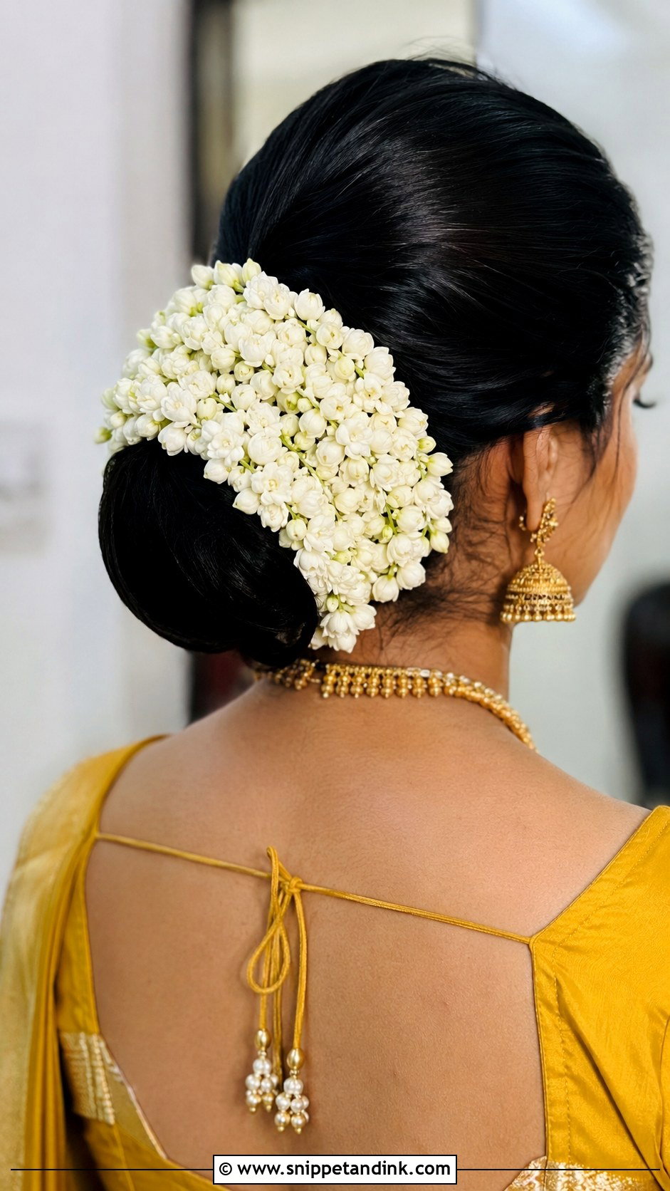Low Bun With Mogra Strings - Snippet and Ink - 20 Seemantham Hairstyle Ideas