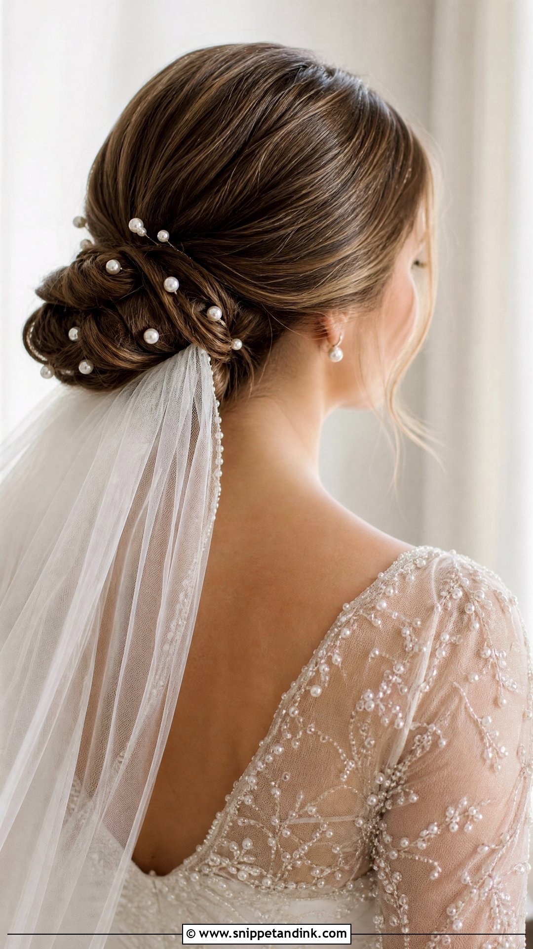 Low Bun With Pearl Accessories - Snippet and Ink - 20 Bride Bun Hairstyle Ideas