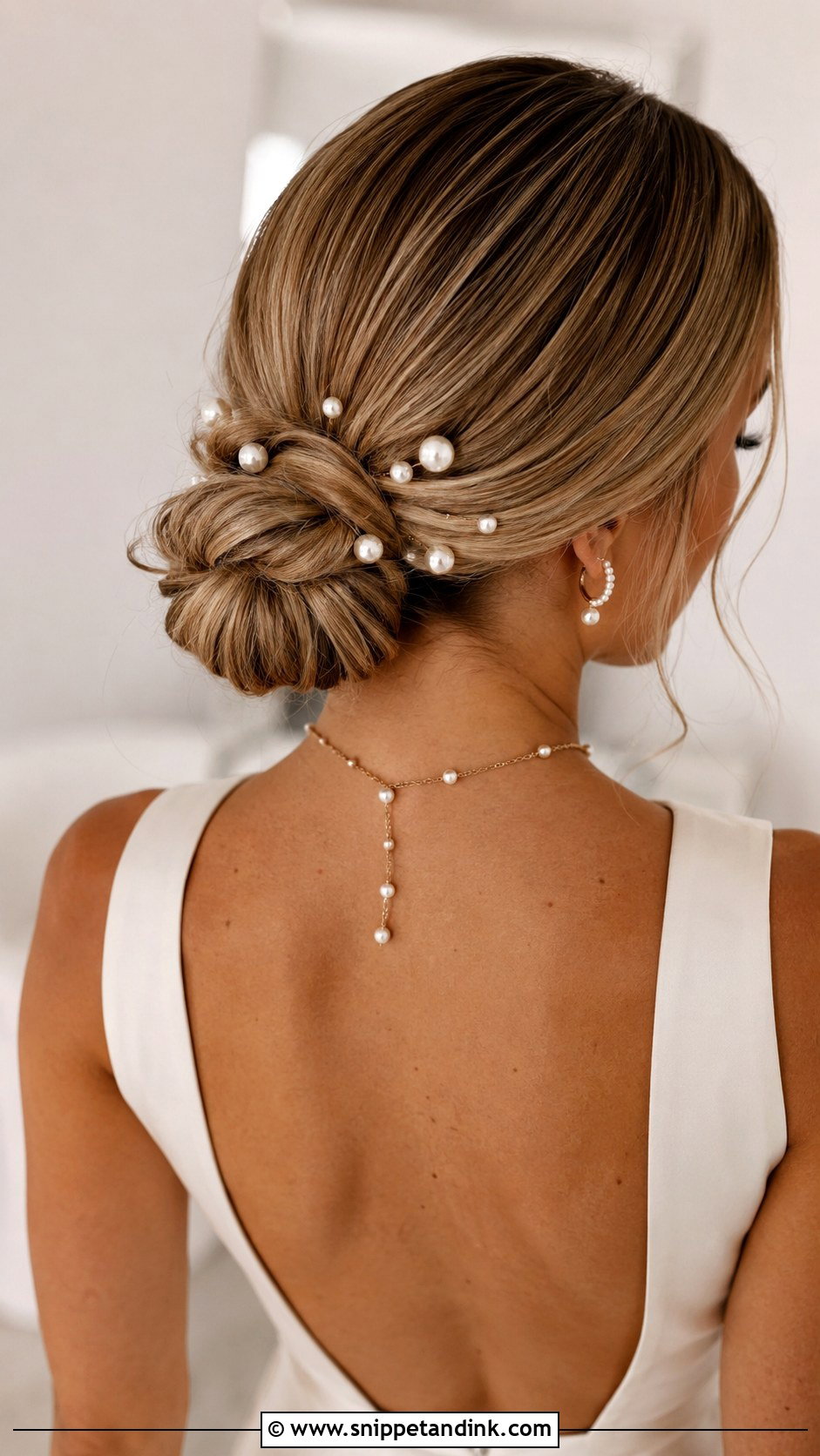 Low Bun With Pearl Pins - Snippet and Ink - 25 Low Bun Hairstyles Wedding