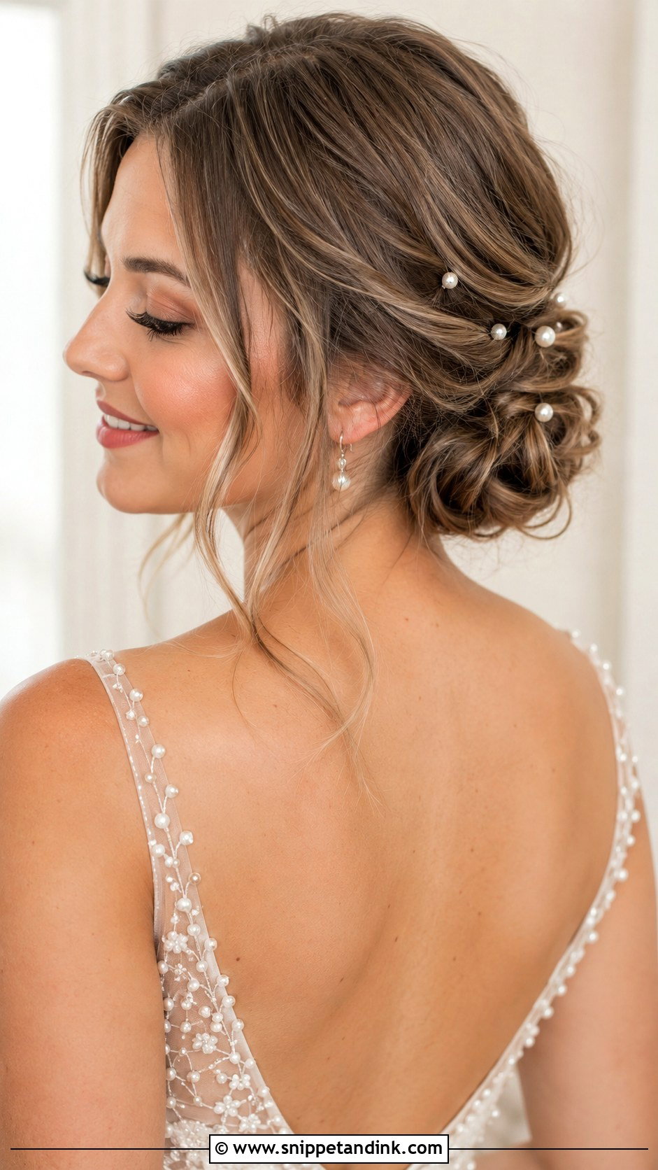 Low Bun With Pearl Pins For Short Wedding Hair - Snippet and Ink - 15 Low Bun Short Wedding Hair Ideas