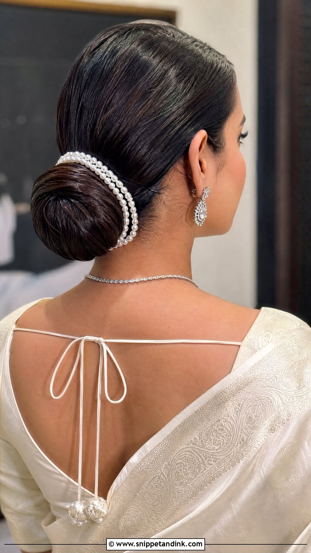 Low Bun With Pearl Strings - Snippet and Ink - 20 South Indian Wedding Hairstyles for Long Hair