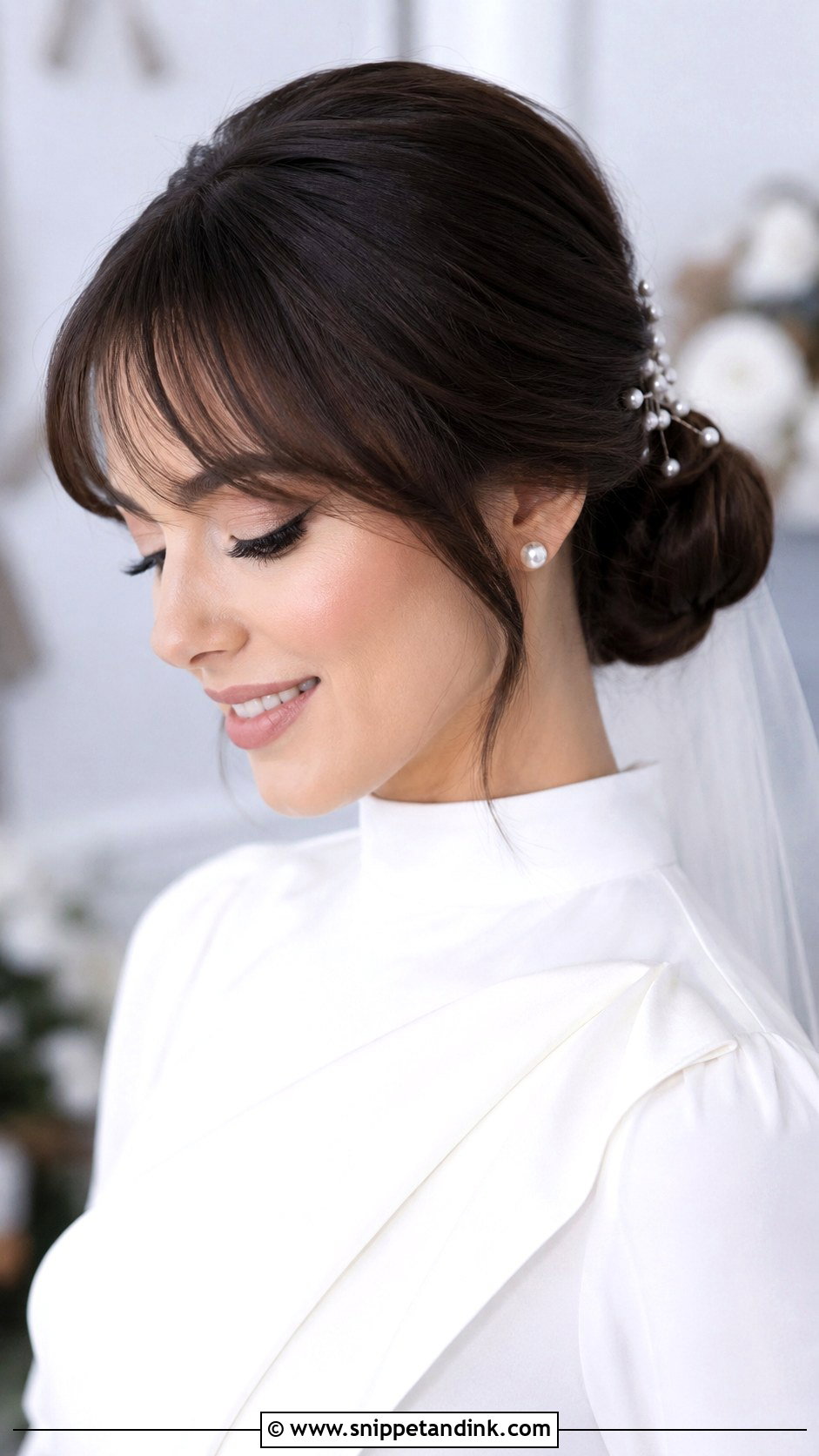 Low Bun With Soft Fringe - Snippet and Ink - 20 Bridal Hairstyle for Big Forehead Ideas