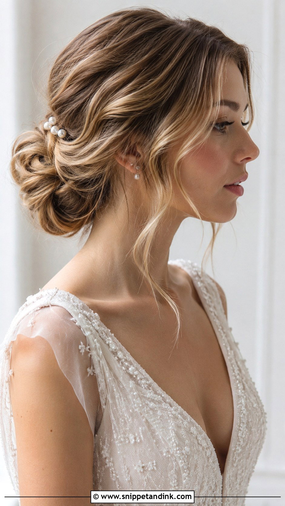 Low Bun With Soft Waves Around The Face - Snippet and Ink - 25 Soft Waves Wedding Hair
