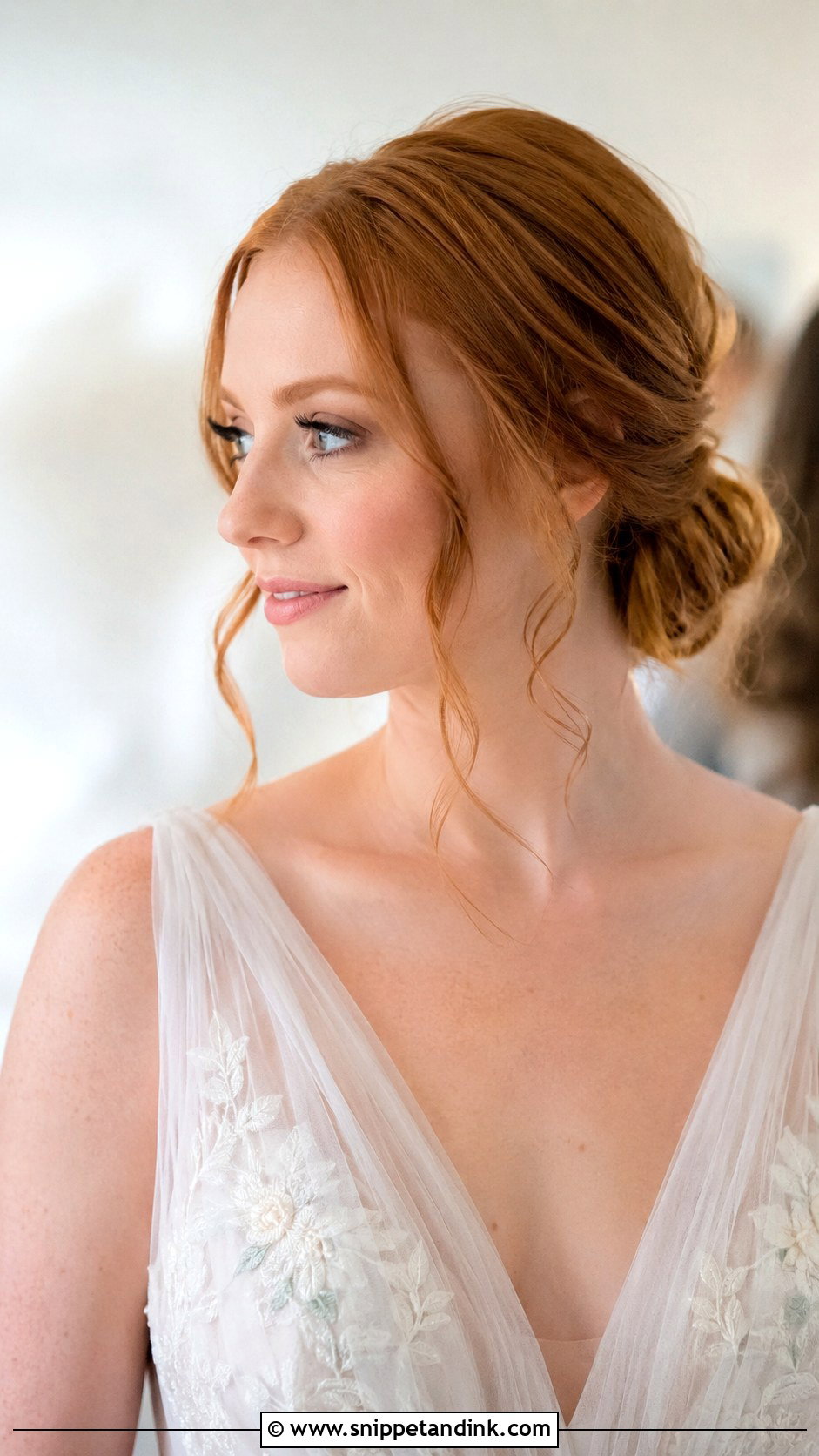 Low Bun With Tendrils - Snippet and Ink - 35 Low Bun Wedding Hair Ideas