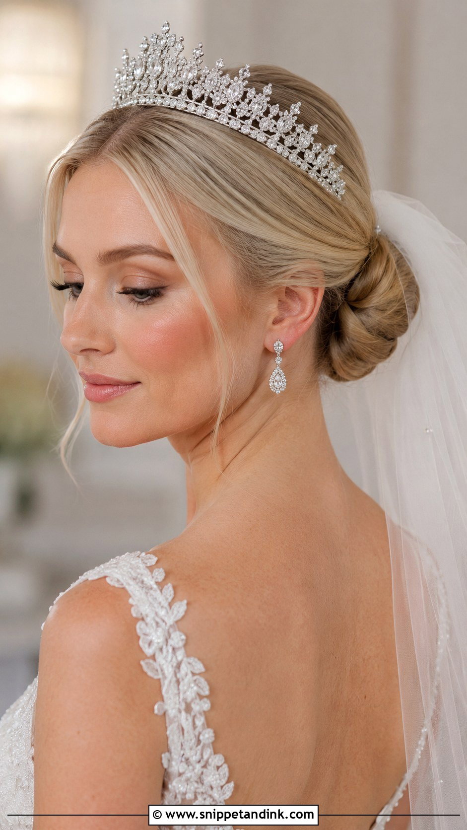 Low Bun With Tiara - Snippet and Ink - 30 Low Bun Bridal Hair Ideas