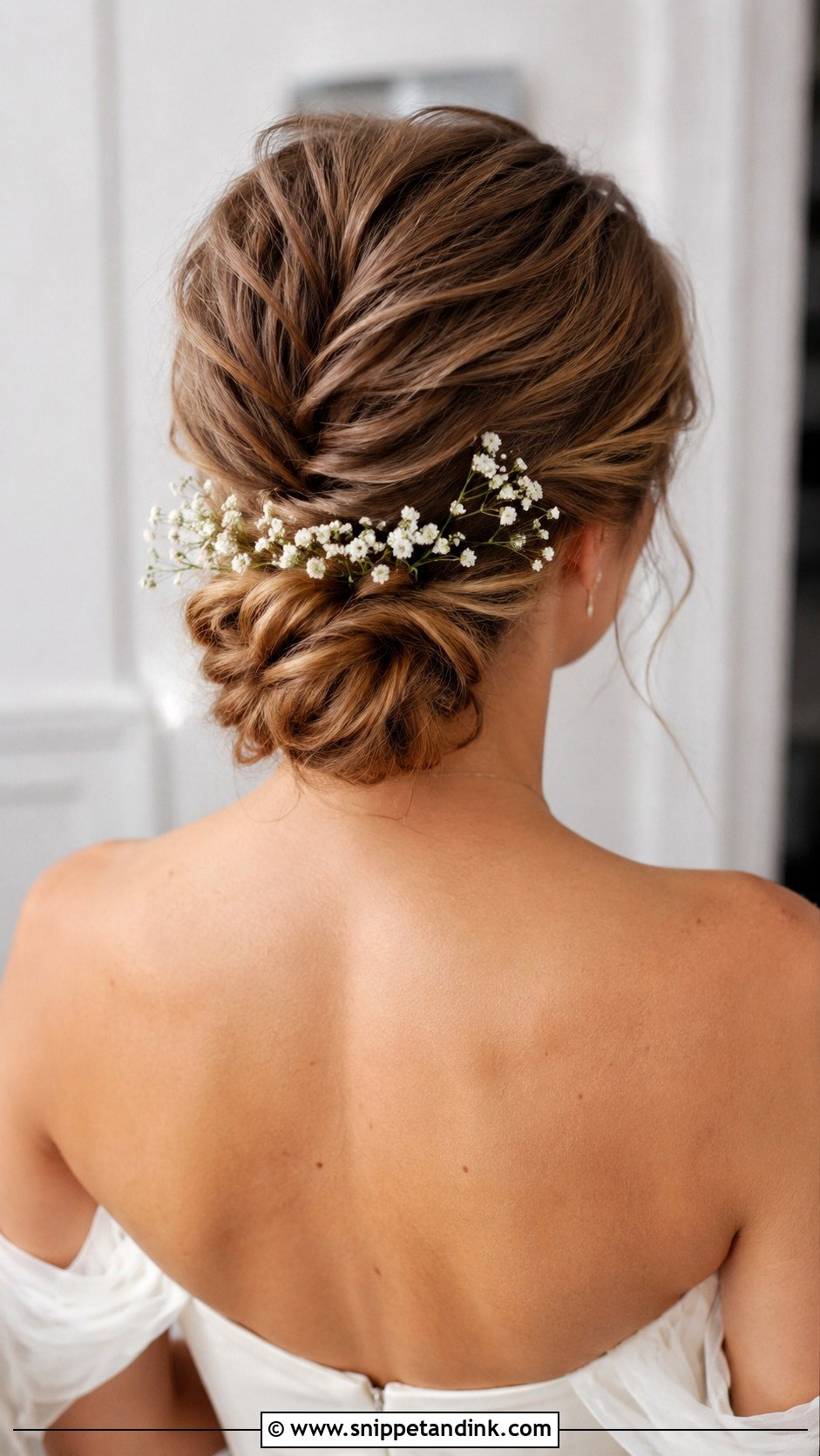 Low Bun With Twists - Snippet and Ink - 20 Long Hair Bride Hairstyles