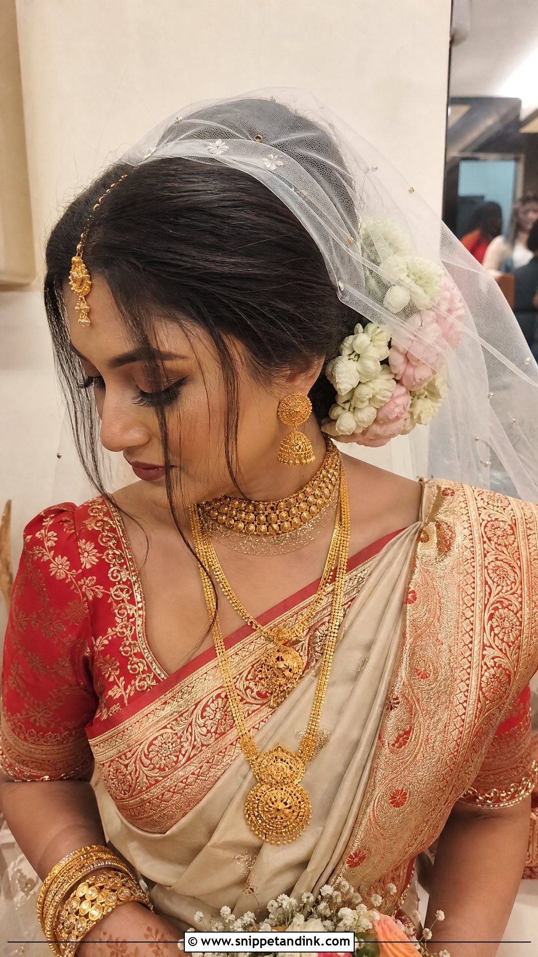 Low Bun With Veil Drape - Snippet and Ink - 20 Bengali Bridal Hairstyle Ideas