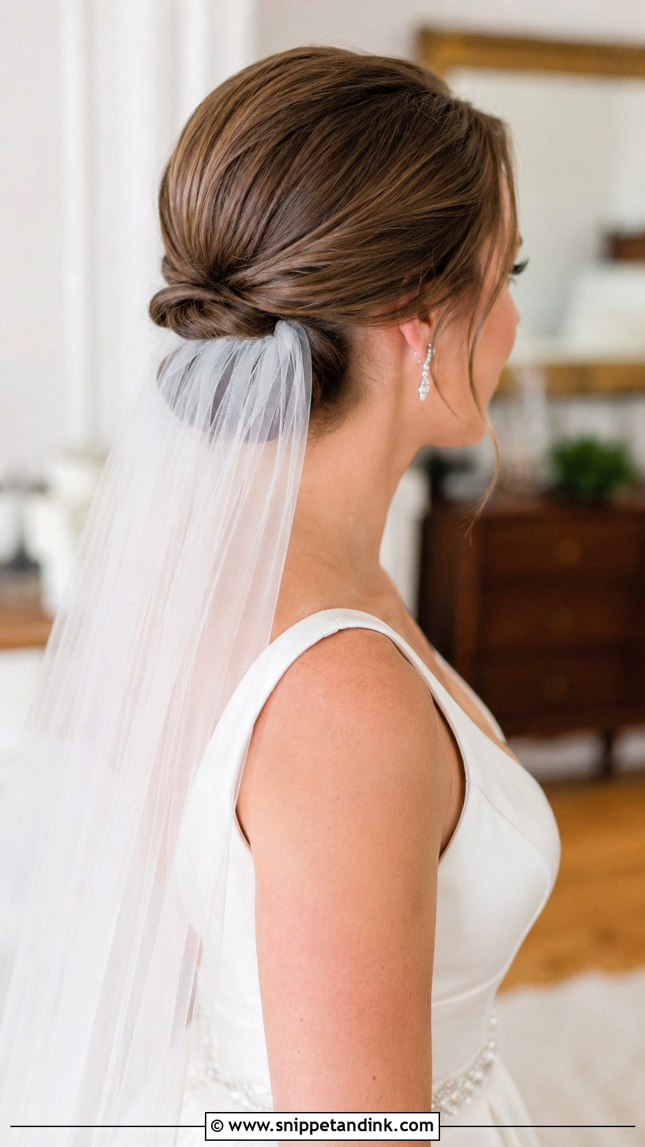 Low Bun With Veil Underneath - Snippet and Ink - 25 Low Bun Wedding Hair Front View Ideas
