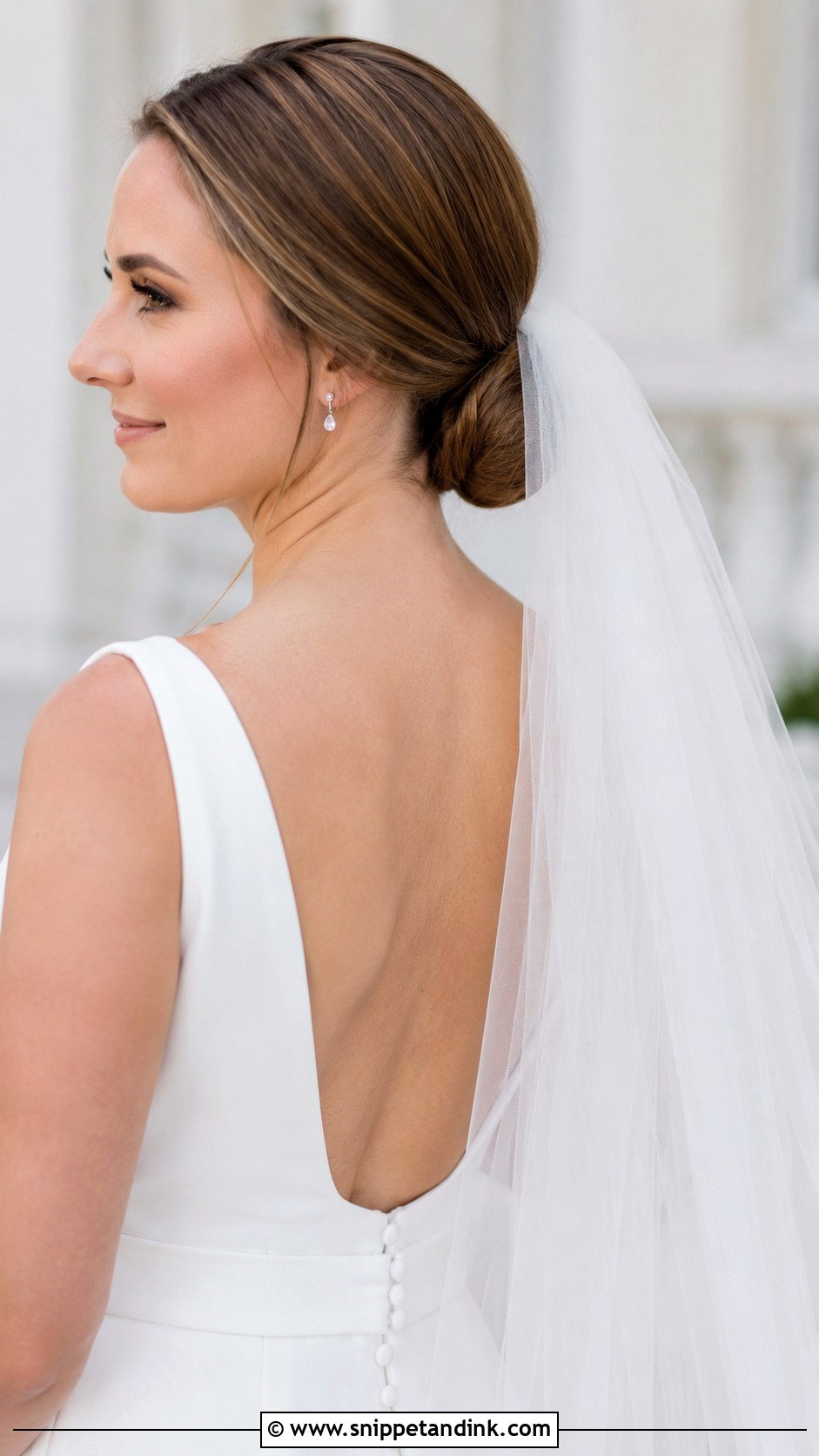 Low Bun With Veil for Brides - Snippet and Ink - 30 Bridal Bun Hairstyles